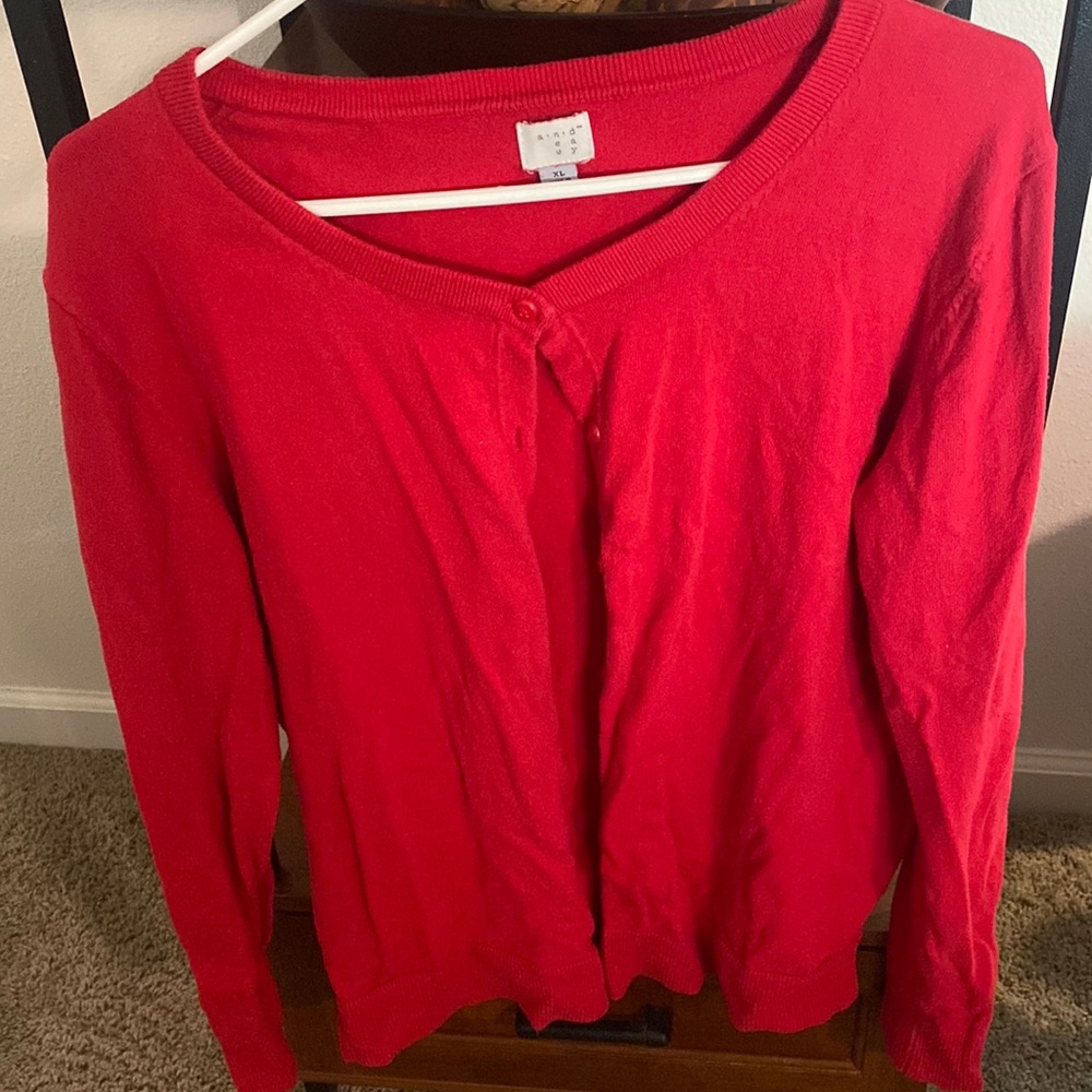 A New Day red cardigan